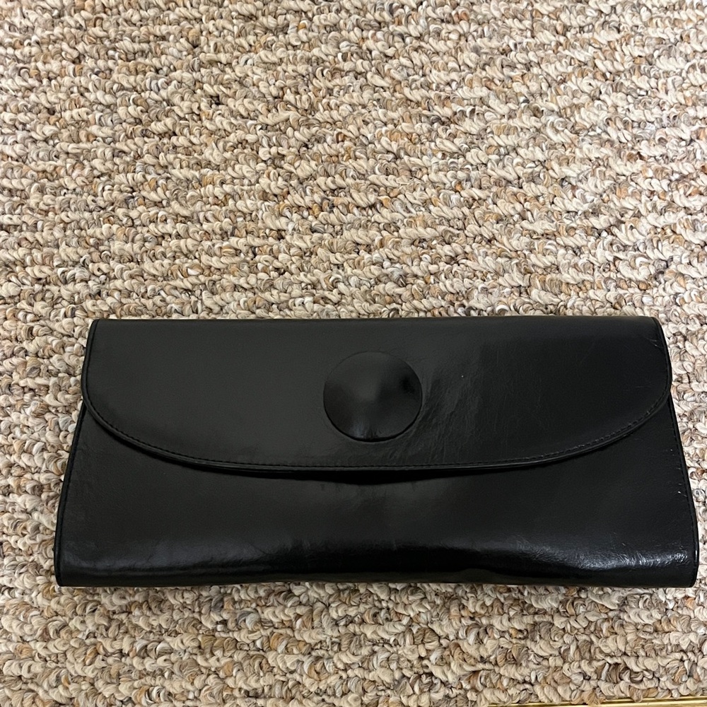 Black Hobo clutch with hand loop in back.